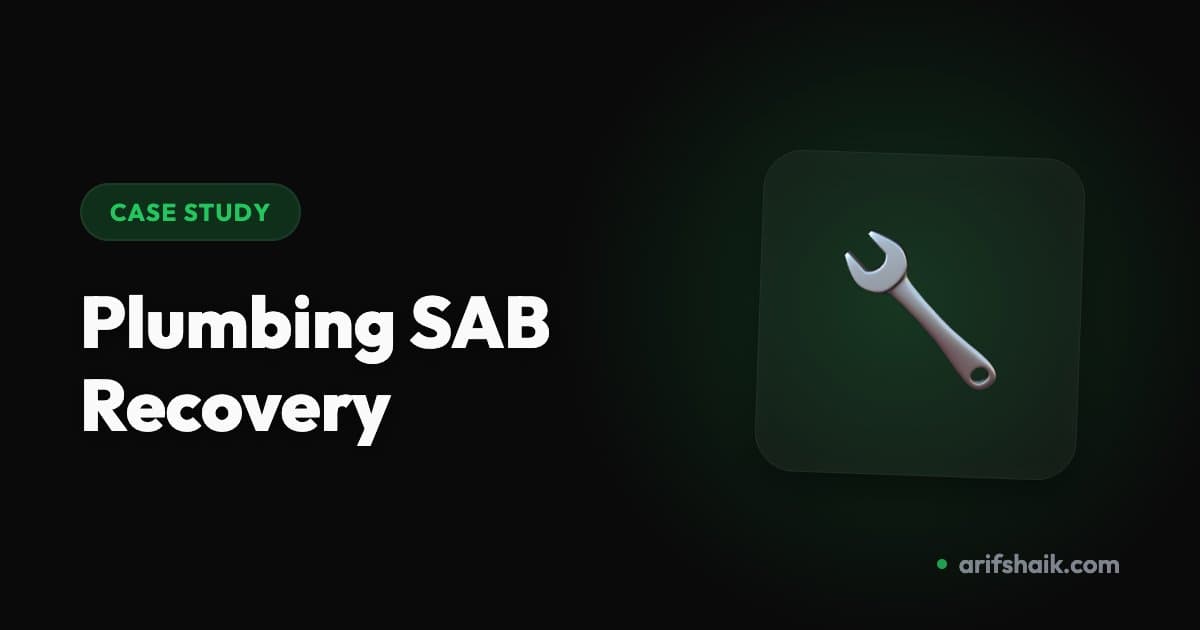 Plumber working on pipes